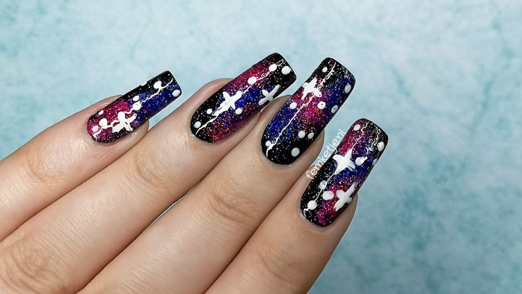 Pastel galaxy nail art design
